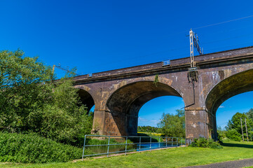 A view of towards the viaduct over the river Great Ouse at Wolverton, UK in summertime