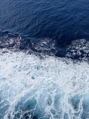 Sea waves background wallpaper view from a cruise ship, boat. Abstract photo ocean water surface
