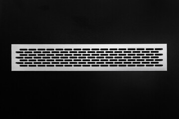 Ventilation air system modern ventilation cooling grille mounted in a black wall, close-up - obrazy, fototapety, plakaty