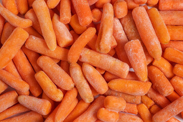 Frozen healthy baby carrots for eating. close up