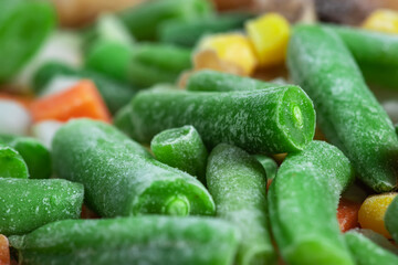 Frozen vegetables. Frozen vegetable mixture of carrots, corn and peas.