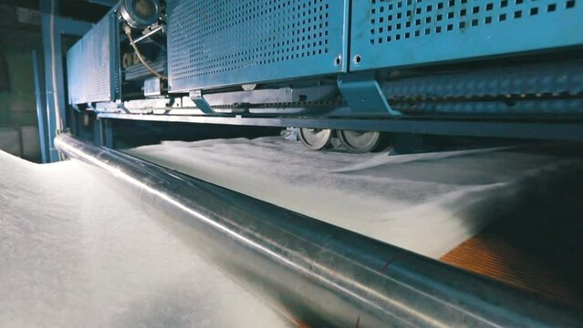 Sintepon production factory. Syntepon manufacturing process. Sintepon production.