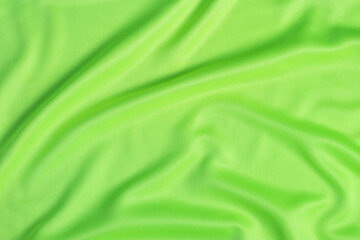 green fabric cloth background texture close up