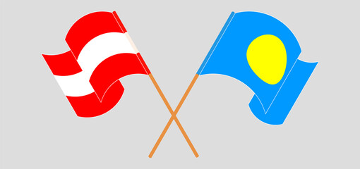 Crossed and waving flags of Austria and Palau