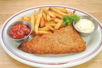 Fish and Chips Dinner Served on a White Plate	
