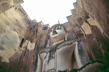 High angel view of the Buddha statue (Phra Ajana) in Wat Sri Chum at the Historical Park in...