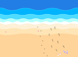 Summer time. Top view of an exotic empty beach with sea stars and seashells. A place for your project. A foamy sea with waves