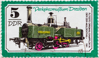 GERMANY, DDR - CIRCA 1977: a postage stamp from GERMANY, DDR, showing the oldest original steam locomotive in the GDR Muldenthal  (1861) . Circa 1977