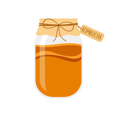 Homemade fermented kombucha in a glass jar on a white background