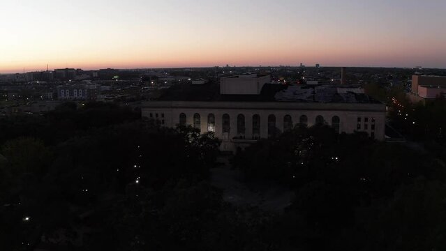 Low Panning Aerial Shot Of Congo Square In New Orleans At Sunset. 4K