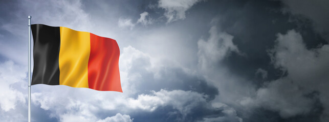 Belgian flag on a cloudy sky