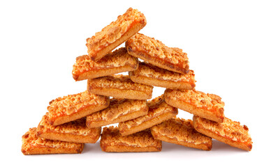 Orange cookies. Cookies with orange filling . The wall made of orange cookies is isolated on a white background .