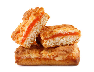Whole and cut cookies with orange filling isolated on a white background .