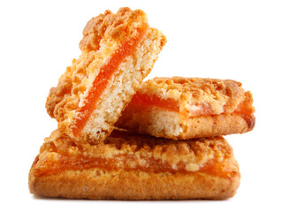 Whole and cut cookies with orange filling isolated on a white background .