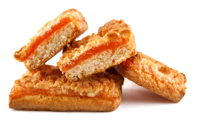 Whole and cut cookies with orange filling isolated on a white background .