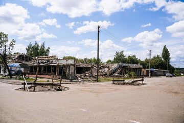 War in Ukraine. Crater from an explosion in the Sumy region. Russia's military invasion of Ukraine.
