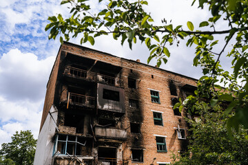 War in Ukraine. A burnt civilian house from the Russian military in the occupied city of...