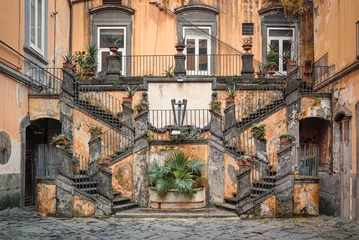 Fotobehang The famous staircases of Palazzo Marigliano, Naples, Italy. Palazzo Marigliano is a historical, renaissance-style  palace in Naples city center. © Maurizio De Mattei