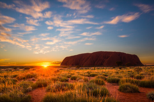 Sun rising over Uluru, Uluru-Kata Tjuta National Park, Northern Territory, Australia