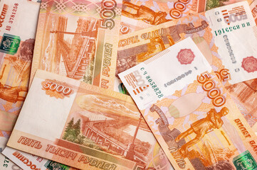 Background from five thousand rubles banknotes.