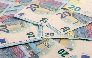 Banknotes of twenty euros laid out on the table.