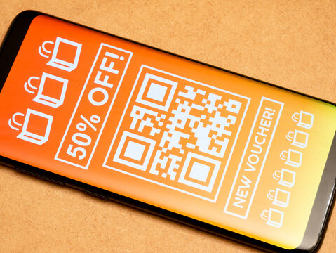 Generic 50 percent off coupon voucher promo QR code template mockup, smartphone display screen detail, closeup, nobody. E-commerce app, full screen marketing, modern digital advertisement concept