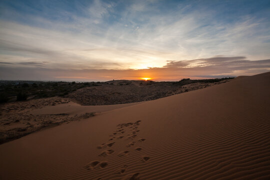 Sunset at Red Sand Dune, Desert in Mui Ne, Vietnam © maodoltee