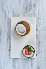 coconut dessert with corn flakes and strawberries