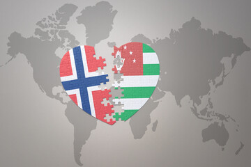 puzzle heart with the national flag of norway and abkhazia on a world map background. Concept.