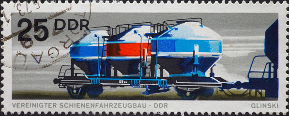 GERMANY, DDR - CIRCA 1973: a postage stamp from GERMANY, DDR, showing a railway tank goods wagon. United rail vehicle construction company . Circa 1973