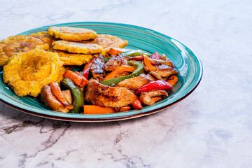 Chopped steak or Bistec Picao and patacones or tostones are fried green plantain slices, made with green plantains, Typical latin food, Panamá, Central America