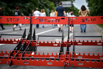 Security mobile vehicle barrier is seen on a pedestrian street