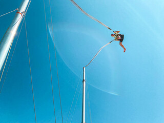 catapult on top of the mountain. entertainment for tourists, active recreation. jump up on a huge...