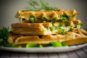 Homemade fried vegetable waffles with herbs inside