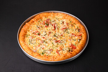 Homemade pizza, pizza on a black background, Georgian cuisine