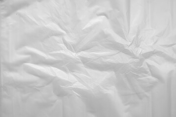 white crumpled plastic texture background, soft focus