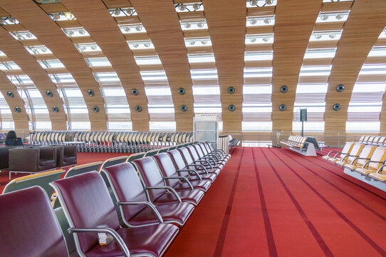 Paris, France - 1 April, 2017: Unidentified people at the hall of departure in the terminal of Roissy Charles de Gaulle International Airport, Paris, France, is a hub for the French airline Air France