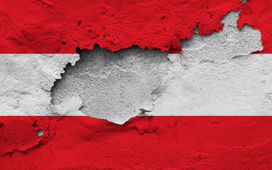 Graphic Concept of a damaged Flag of Austria painted on a wall.