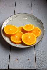 circular slice of oranges on a plate