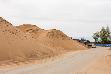 Mountains of sand at the construction site.