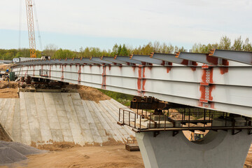 Metal structures of the new bridge on the support.