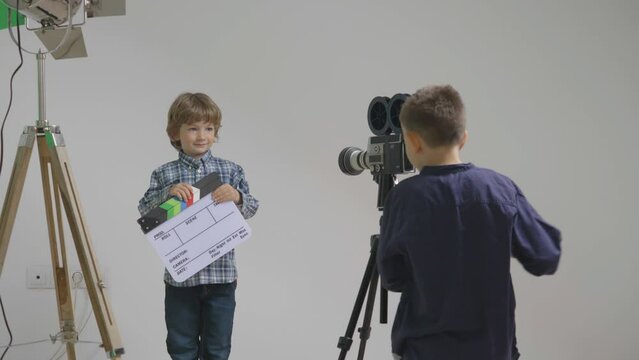 Director stage with loudspeaker and video camera and funny actor,  future cinematography and theater