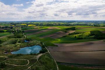Green Countryside Landscape at Spring. Drone Aerial View. Poland Farmlands