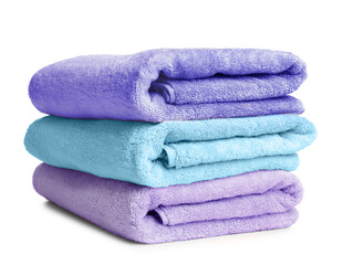 Folded soft terry towels on white background