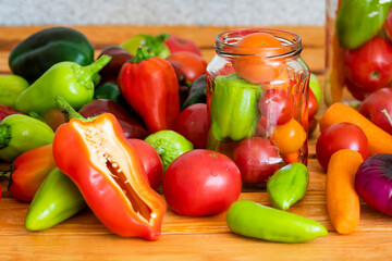Vegetables: sweet peppers, paprika, tomatoes, carrots, onions. Ingredients for lecho - the national dish of Hungarian cuisine - prepared for preservation in a glass jar