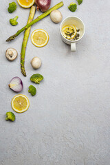 Close-up of organic fresh green asparagus. Concept of  healthy vegetarian food, diet and home cooking. Copy space.