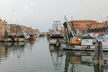 fishing boats in the navigable canal near Adriatic Sea in Northern Italy