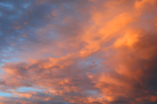 blue sky and clouds with orange and pink colors in spring © ChiccoDodiFC