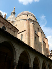 Fototapeta na wymiar Basilica of Saint Anthony of Padua in the Veneto Region in Northern Italy in Europe with dome and architectural arches in the inner courtyard