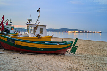 Picturesque fishing boat on beach in Sopot, Pomorskie region, Poland - obrazy, fototapety, plakaty
